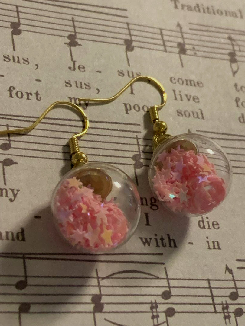 Pink stars in a ball