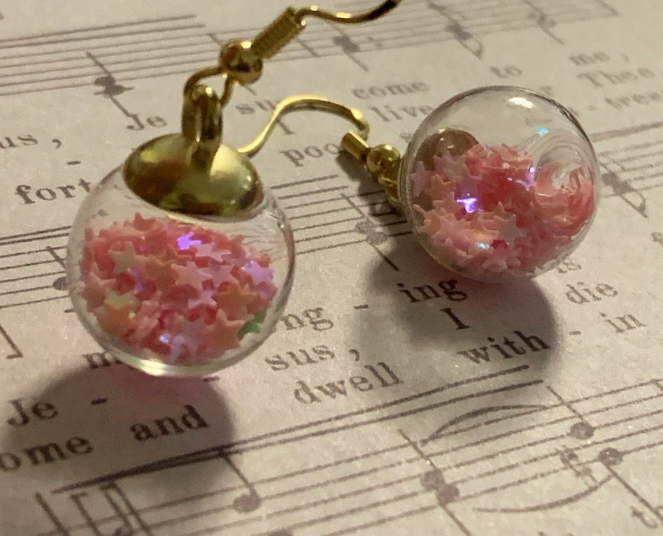 Pink stars in a ball