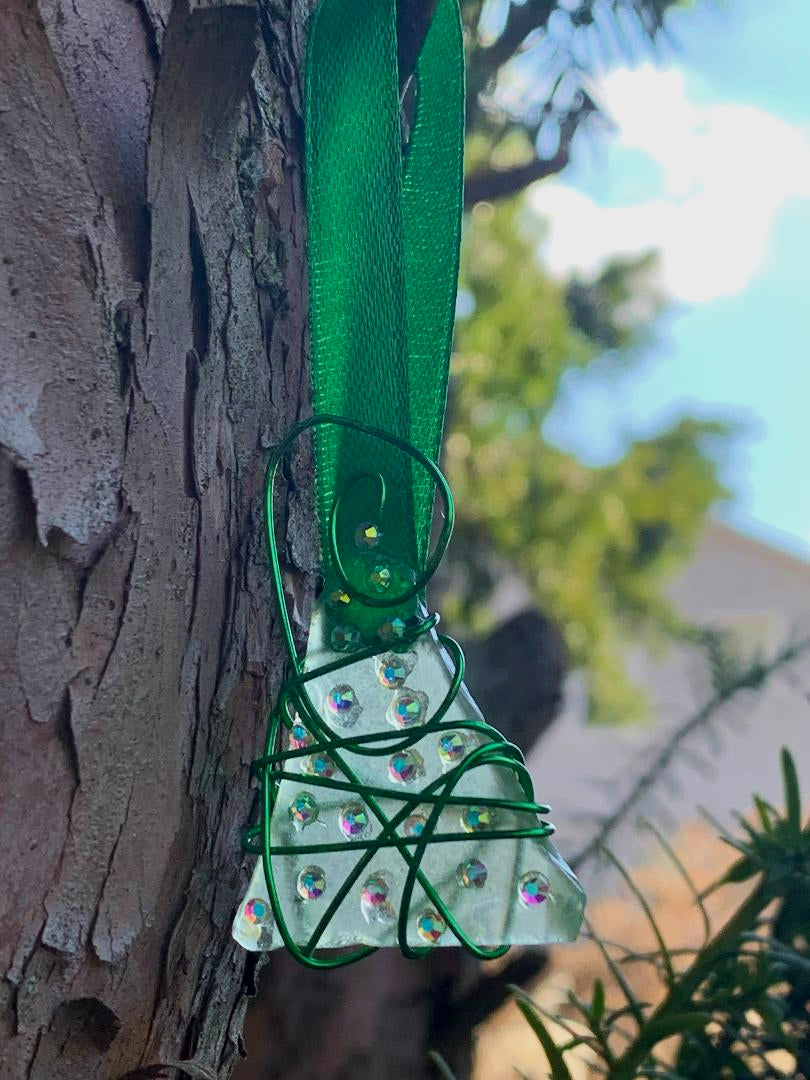 When a tiny sea glass Christmas tree is shining