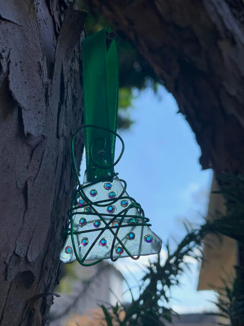 When a tiny sea glass Christmas tree is shining
